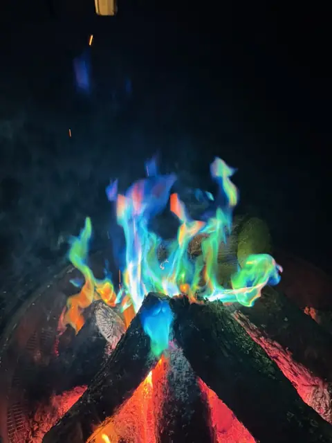 Rainbow flames in the fire pit