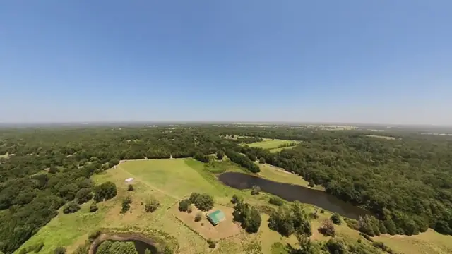 The cabin, the big pasture and both ponds from the air
